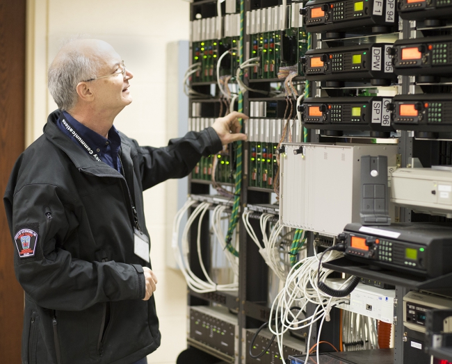 Staff showing computer tower